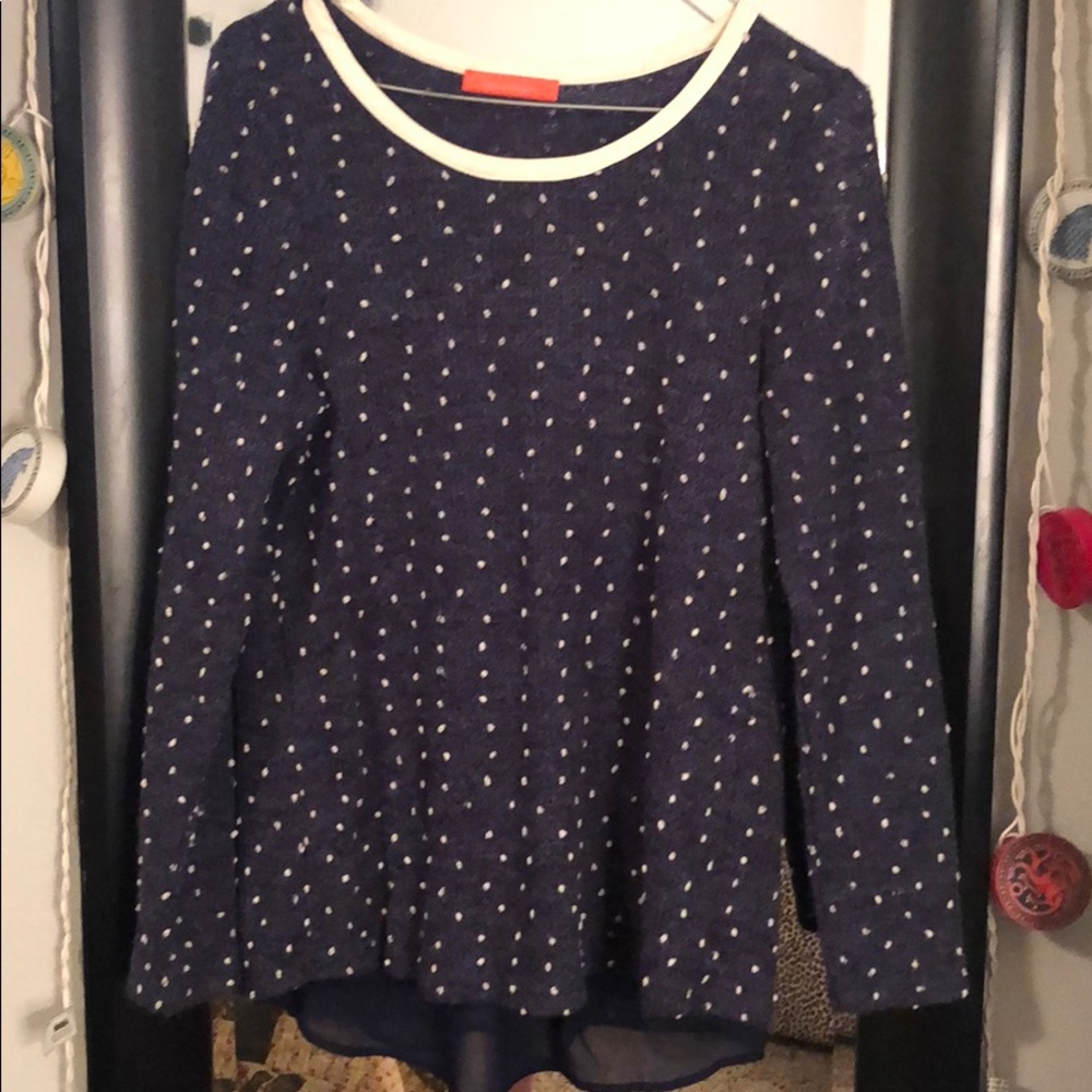 Sweater with leather neck lining